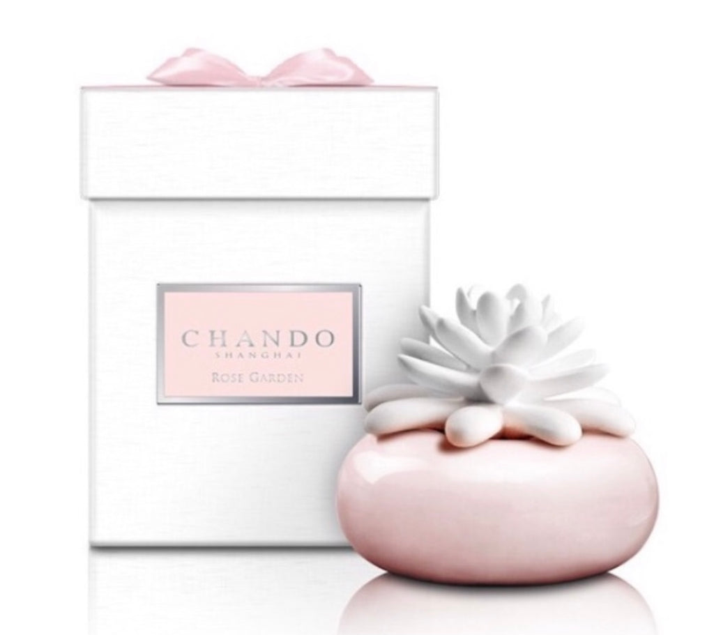 Chando Elegance Collection- Midnight Crystal Fragrance product image features Elegant packaging. A soft pink, polished porcelain vase, unglazed dandelion flower diffuser, 100ml bottle of Midnight Crystal oil fragrance, one plastic funnel. Fragrance is alcohol free and has the aroma of lily of the valley with a hint of freesia. Elegant and unique. Fabulous gift for Christmas, Valentine's Day,  Mother's Day, gift for loved one, party hostess. Great housewarming gift.
