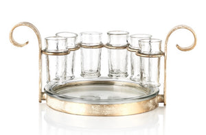 Six Shot Tequila Set-Gold product image features a decorative iron stand holding six tall shot glasses and a glass plate. Stand is aged gold. Perfect for bar and man cave. Measures 14.25"L X 9"W X 6.5"H.  Comes gift wrapped for Father's Day.