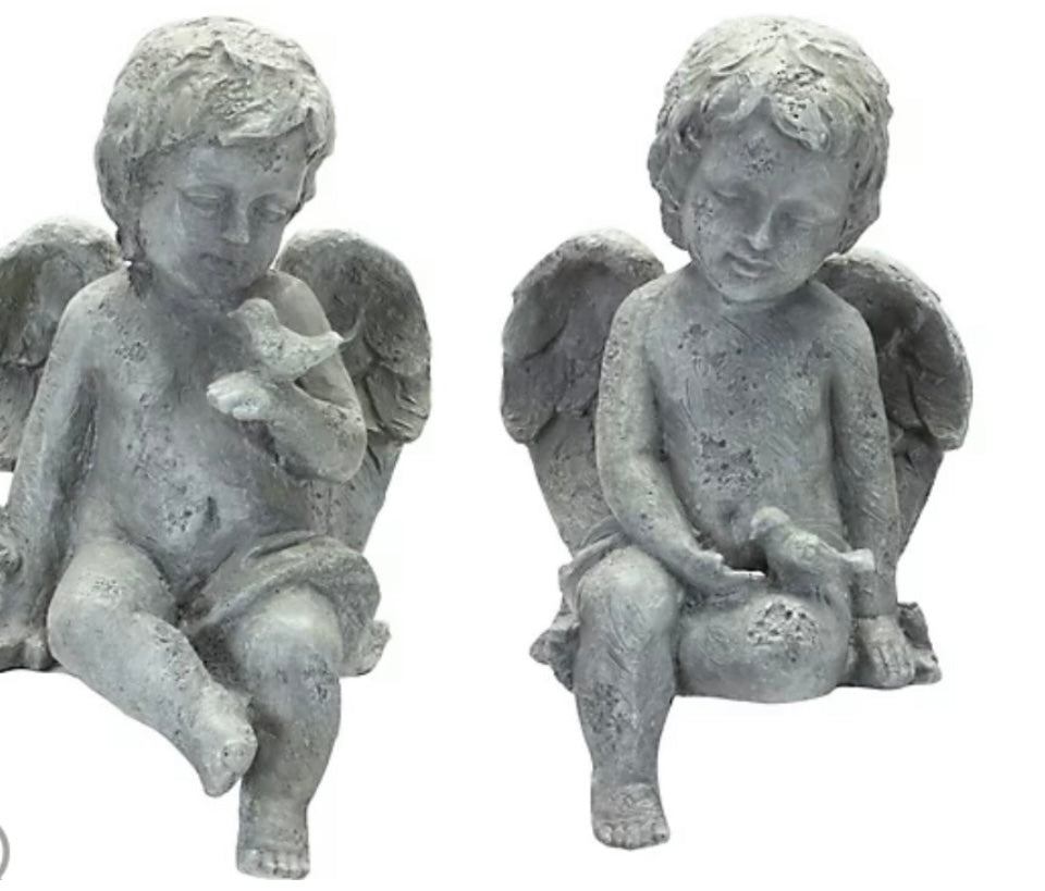 Little Angels product image features two Sitting Cherubs.  Sitting Cherub.  One with bird on wrist. One with bird on lap.  Color is gray.  Material is polyresin.  Measure 6"x6.5"x11" and 7"x7.5"x11". 