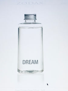 Zodax Dream Diffuser Fleur D' Oranger Fragrance Refill product image features a clear plastic bottle filled with about three quarters  of Fleur D'Oranger oil fragrance.   Burning not recommended. 