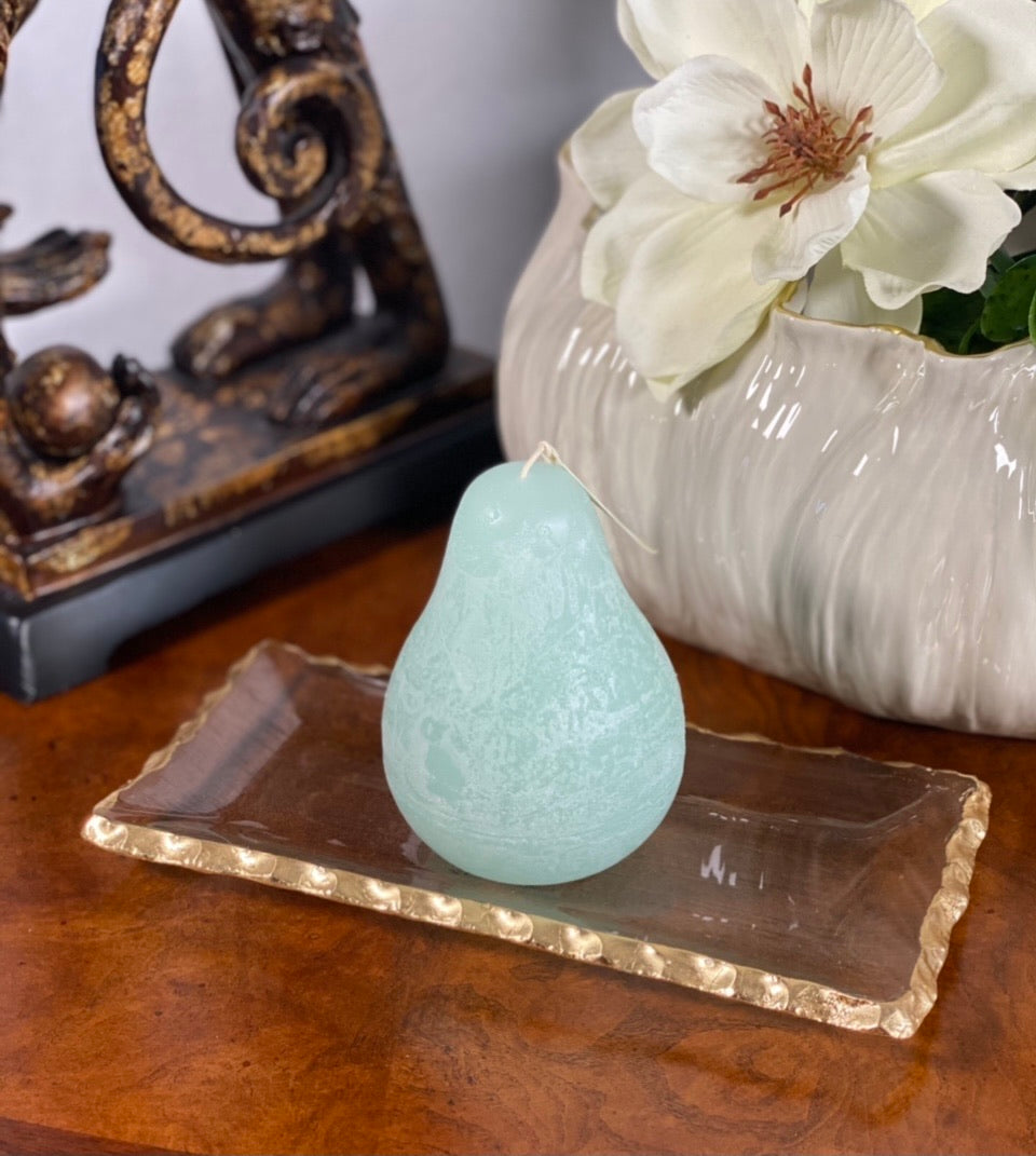 Timber Pear Candle Seafoam product image features one pear shaped candle on gold rimmed glass tray. Vance Kitira Collection. Seafoam color.   Gold rimmed glass tray available for sale in store.