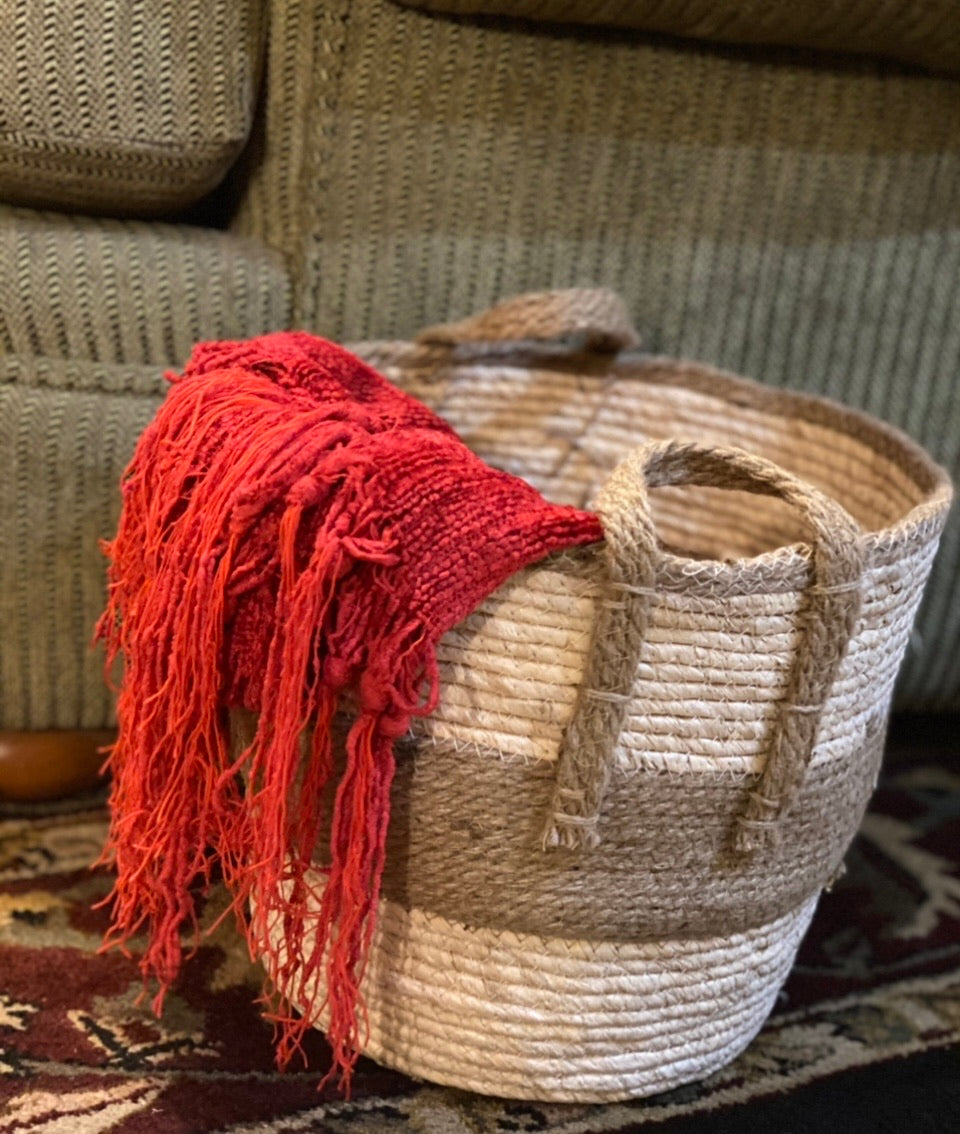 Decorative Baskets product image features largest of the three baskets in the set holding a throw blanket.