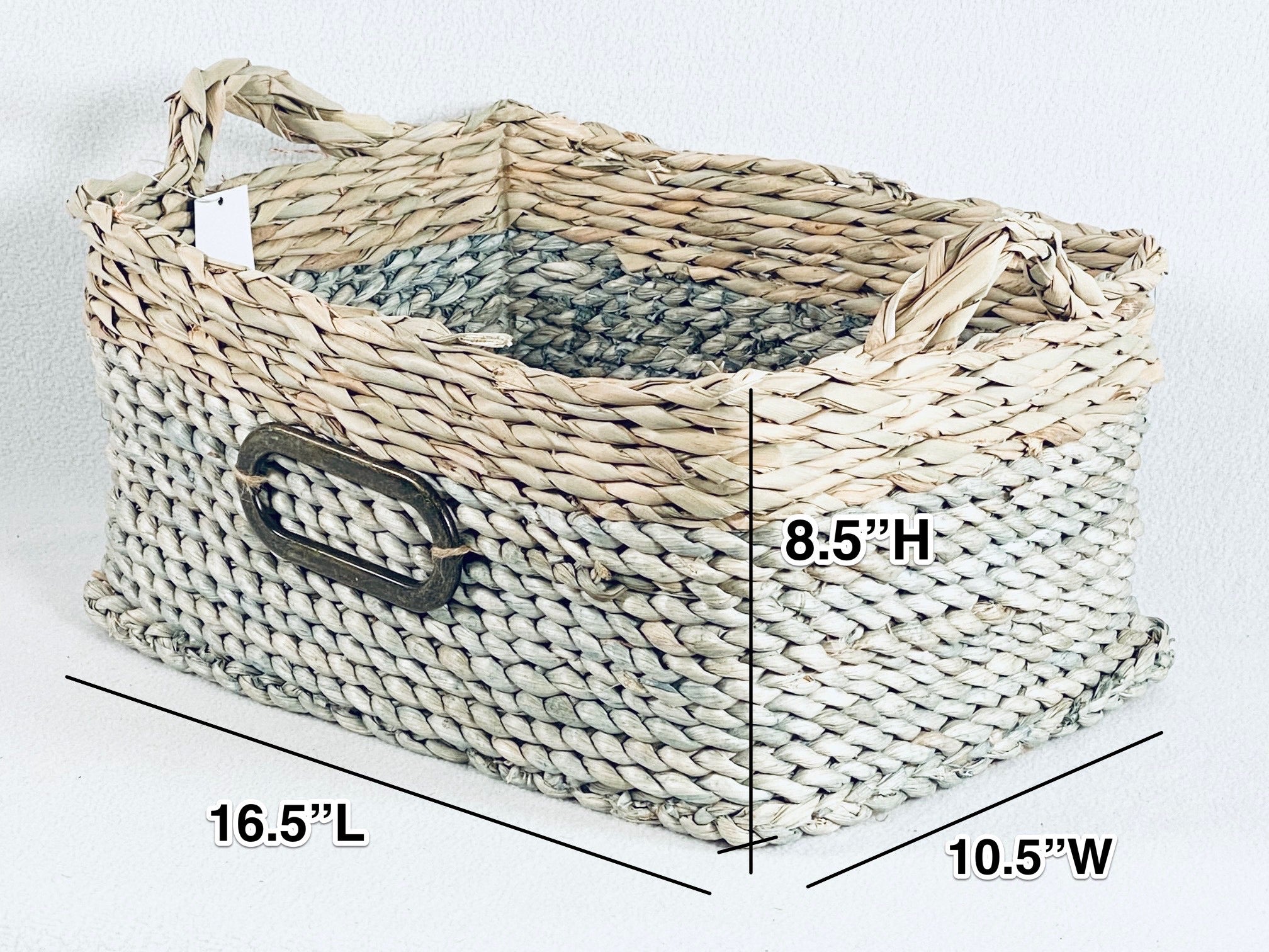 Straw Basket Set product image features the larger of 3 baskets in the set .  Material: natural straw. Color: Dusty blue and natural. Size:16.5"L X 10.5"W X 8.5"H
