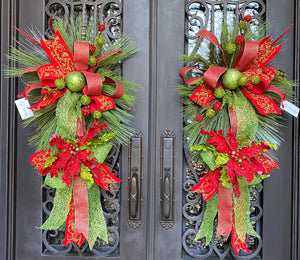 Christmas Door Swag product image features two red and green swags hanging side by side on double doors.
