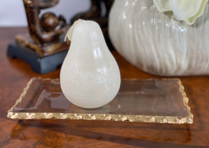 Gold Rimmed Rectangular Tray product image features a clear glass tray holding a melon white Timber Pear candle.  Tray has a jagged gold rim. Rectangular in shape. Measures 9"L X 4" W X .5" H. Food safe. Candle tray. Hand wash only.