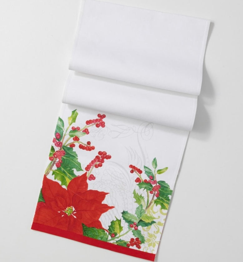 Poinsettia Table Runner product image features a festive table runner.  Extra Long.  White cotton with bright red poinsettia, green holly leaves and red berries image at both ends of runner.   Measures 70.5"L X 14.25"W.