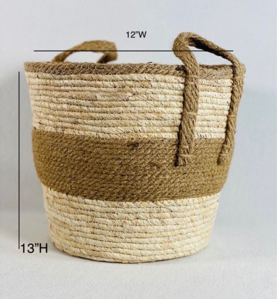 Decorative Baskets product image features largest of the three baskets in the set.   Made of woven maize peel and jute.  This basket has double handles.  Color is natural and brown. Size is 13"L X 12'W.  This size basket is perfect for holding your throw blankets, nursery toys or plants.