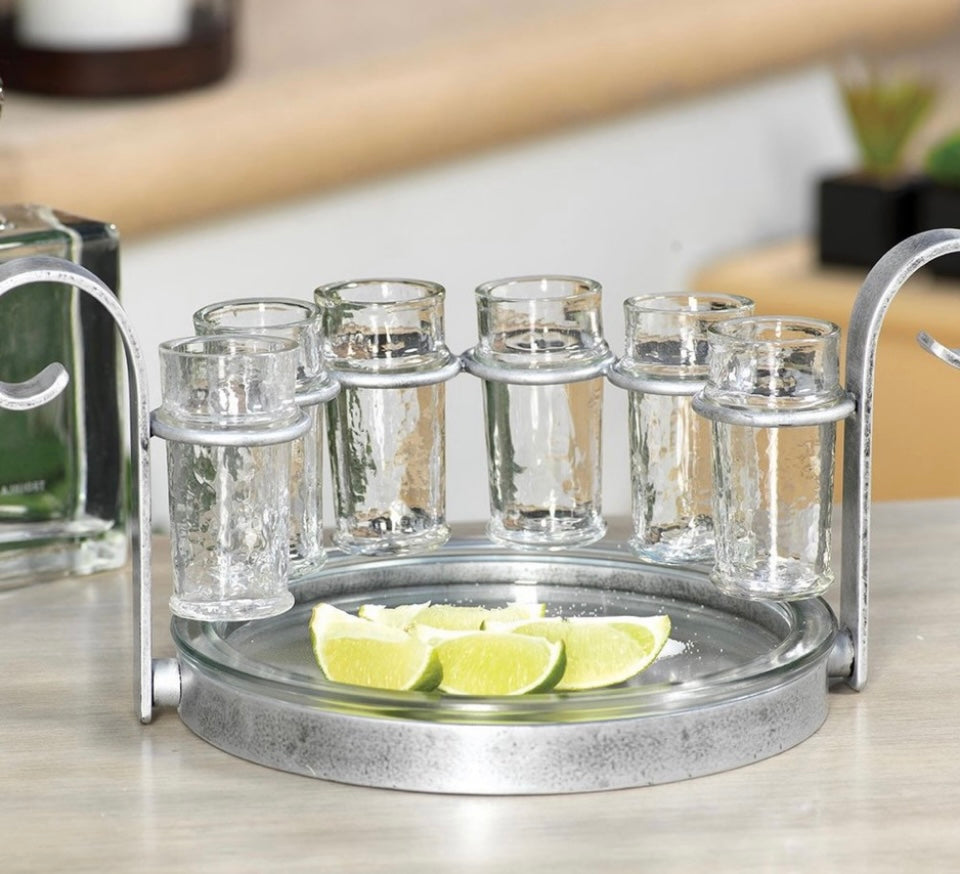  Tequila Shot Set-Silver product image features a decorative iron stand holding six tall shot glasses, a glass plate and Lime wedges for display only. Stand is aged silver. Perfect for bar and man cave. Measures 14.25"L X 9"W X 6.5"H.   Lime wedges not included. Comes gift wrapped for Father's Day.