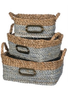 Straw Basket Set product image features a set of 3 different size baskets.  Material: natural straw.  Color: Dusty blue and natural.  Sizes:  16.5"L X 10.5"W X 8.5" H,  15"L X 9.5"W X 7" H and  12.5"L X 7"W X 5.5" H.  Perfect for storing home accessories on your table tops and shelves.